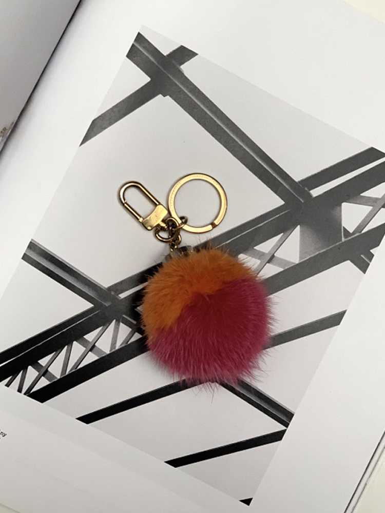 Louis Vuitton Fluo Bubble Bb Bag Charm & Key Holder In Orange