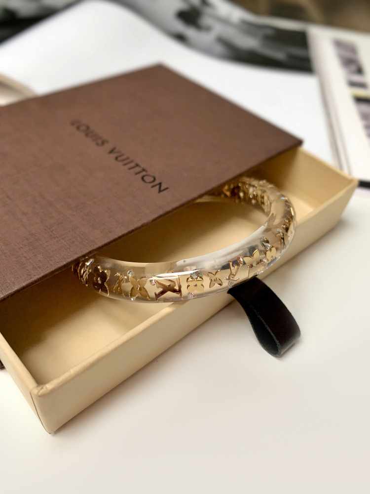 Inclusion bracelet Louis Vuitton Ecru in Plastic - 34291572