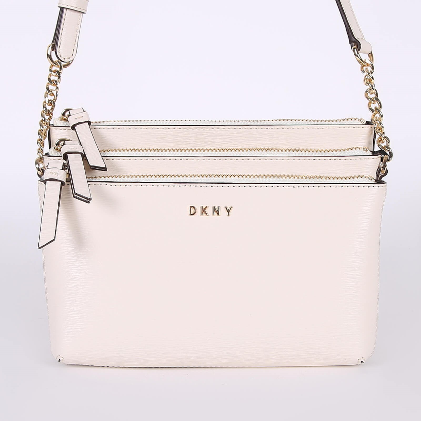 DKNY Bryant Triple Zip Leather Crossbody Bag Ivory www.luxurybags